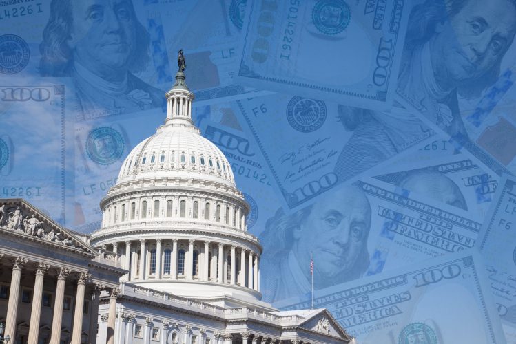 US National Capitol in Washington, DC.   The building of the United States Congress is on the background of 100 dollar bills. Collage